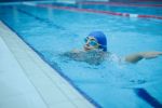 Young person swimming 